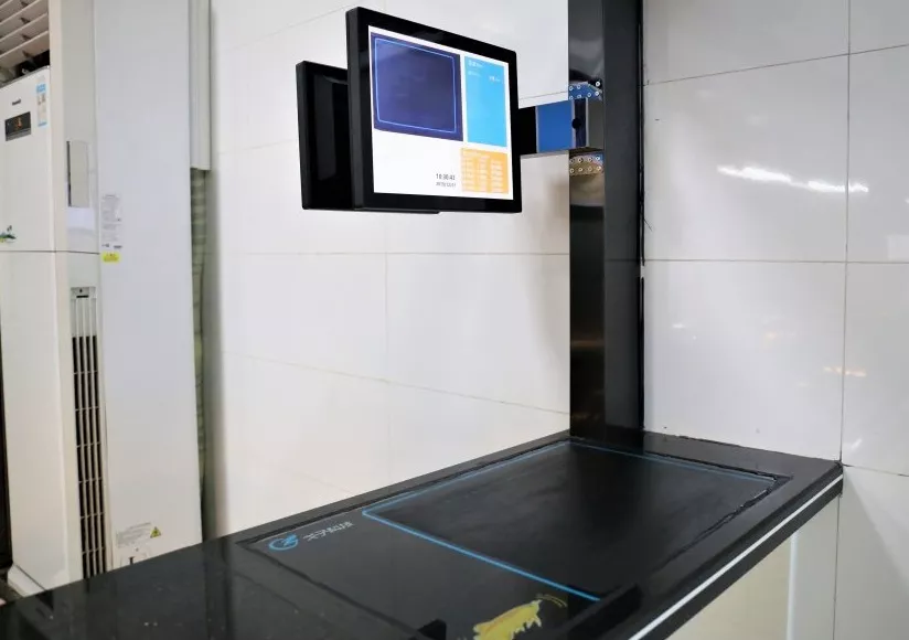 智慧食堂方案中搭載著視覺結算系統的智能結算臺